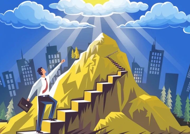 Professional climbing a mountain with sunlight breaking through clouds